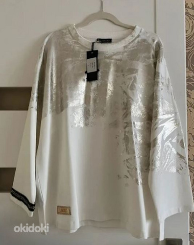 Новый. Подходит для размеров XL, XXL