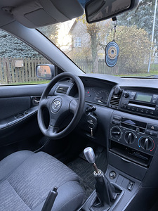 2003 Toyota Corolla 1.4 VVT-i (7 foto / 9)