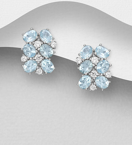 Серебряные серьги 925 пробы с голубым топазом (1 фото из 4)