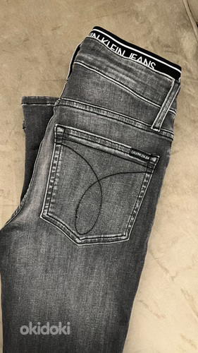 Uued Calvin Klein Jeans teksad,Suurus: 158/164