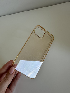 iPhone 14 ümbris kuldne glitteriga (1 foto / 1)