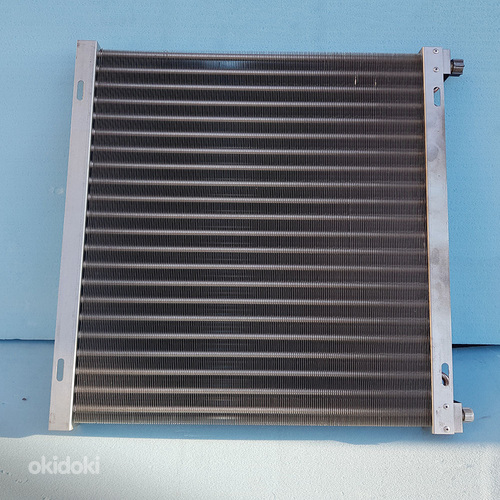 Радіатори (конденсатори) для комбайнів, тракторів, вантажівок