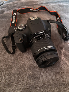 Фотоаппарат Canon EOS 2000D + объектив (4 фото из 5)
