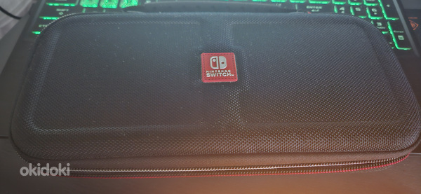 Nintendo Switch +4 mängu (foto #2)