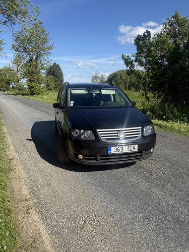 М: Volkswagen Touran