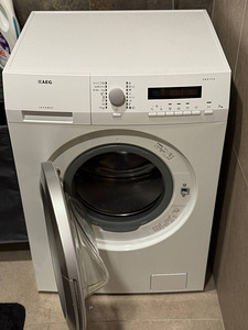 AEG pesumasin, 7 kg, heas seisukorras (1 foto / 2)