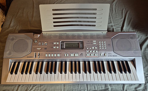Синтезатор Casio CTK-800 со стойкой и стулом (2 фото из 10)