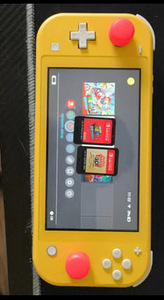 Nintendo switch lite+ 256gb micro SD+ 2 Mario mängu (2 foto / 3)