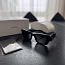 Солнцезащитные очки Prada (фото #1)