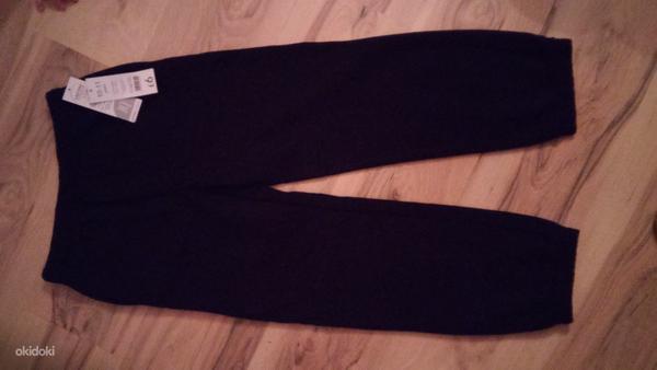 Новые черные спортивыне штаны на 10-11 летнего (фото #1)