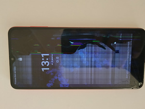 Samsung Galaxy A12 telefon (1 foto / 2)