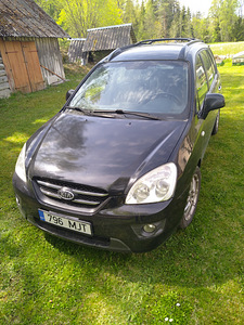 Kia carens (6 foto / 8)