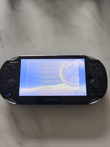 Sony PS Vita + 2 mängu + lisatarvikud (4 foto / 6)