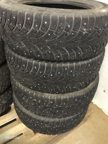 Шипованные шины Bridgestone Noranza 215/65 R16 102 T (фото #1)