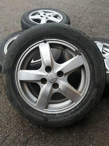 Toyota ориг. литые диски 15" 4X100 с летними шинами (1 фото из 5)