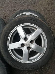 Toyota ориг. литые диски 15" 4X100 с летними шинами (2 фото из 5)