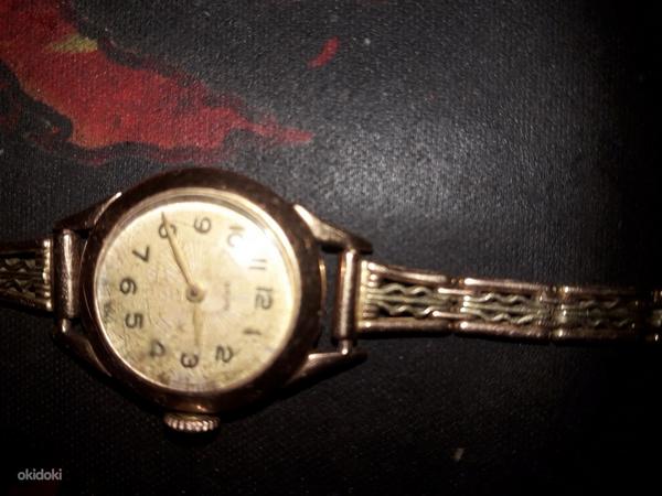Продам золотые часы (фото #4)