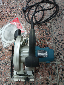 Ümmargune saag Makita HS6601 koos lisakettaga (5 foto / 5)