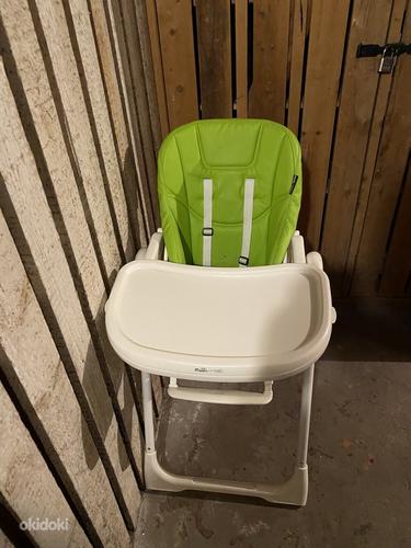 A high chair is a piece of furniture (foto #1)
