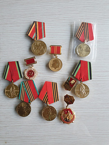 Медальи