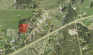 Müüa 5973m² suurune kinnistu Eliste teel, Kuressaarest 3,5km (1 foto / 2)