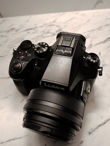 Panasonic Lumix DMC-FZ2000 + аккумулятор (2 фото из 7)
