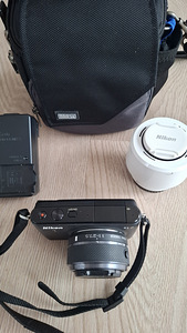 Фотоаппарат Nikon S1 (3 фото из 4)