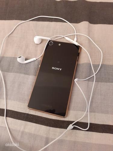Sony m5 aqua töötab koos iphone handsfree (foto #2)