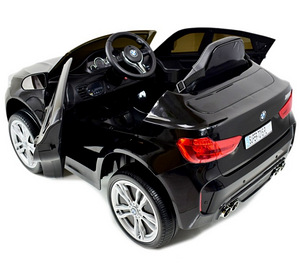 Laste must elektriauto BMW X6M puldiga (3 foto / 4)