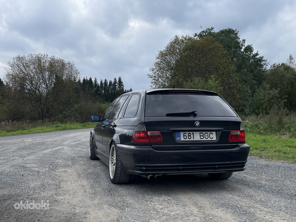 BMW 330dA 135 кВт (фото #4)