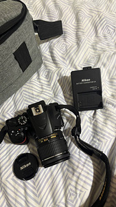Nikon D3500 + комплектный объектив + сумка для камеры и друг (2 фото из 5)
