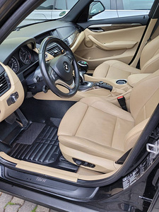 BMW X1 2012 год (2 фото из 4)
