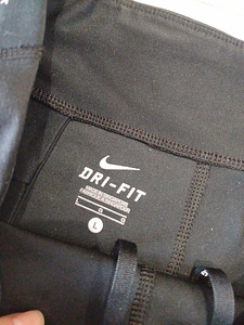 Nike lühikesed püksid naistele suurus L (4 foto / 6)