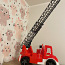Детская игрушка в виде красной пожарной машины (фото #2)