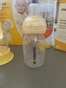 Uus Medela rinnapump+ Calma lutipudel+ Piima säilituskotid (4 foto / 6)