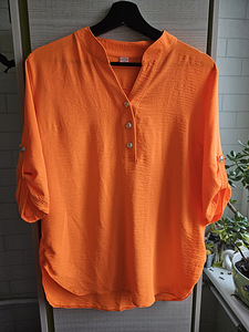 Новая оранжевая рубашка. Вискоза. Размер 42.