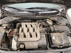 Ford Mondeo Ghia 2.5 V6 125kw (7 foto / 7)