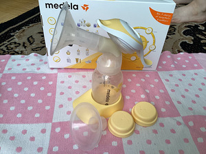 Ручной молокоотсос Medela (2 фото из 2)