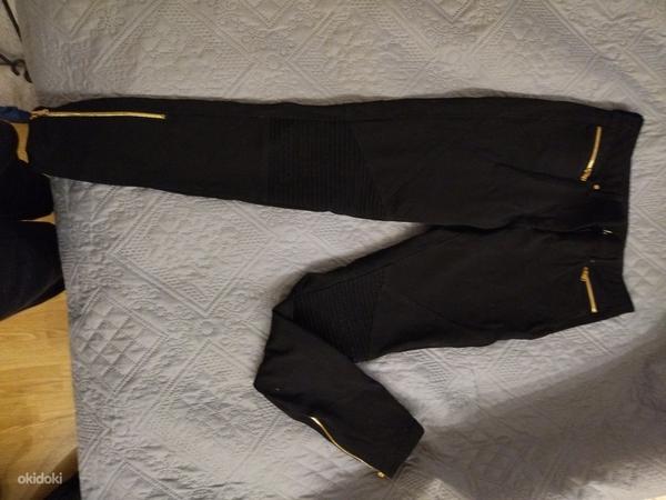 Ilusad mustad püksid.suurusele xs ( 34) (foto #1)