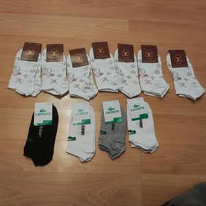11 X LV JA LACOSTE NAISTE SOKID MADAL PROFIIL 36-40 EU (1 foto / 1)