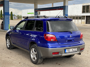 Mitsubishi Outlander | Бензин | мануал (4 фото из 6)