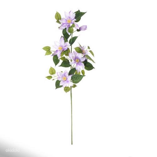 Искусственный цветок в светло-фиолетовом климате, прикрепленный к стеблю (фото #1)
