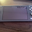 Nintendo Switch Lite Grey с играми (фото #1)