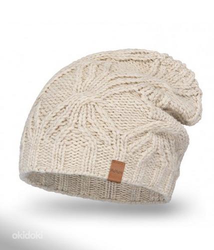 Теплая и мягкая модная зимняя шапка для женщин (фото #1)
