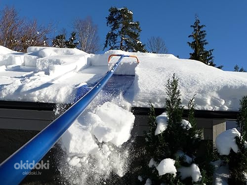 Sniega tīrīšana no jumtiem (foto #5)