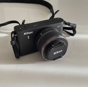 Nikon 1 J1 + 10-33mm objective (1 foto / 2)