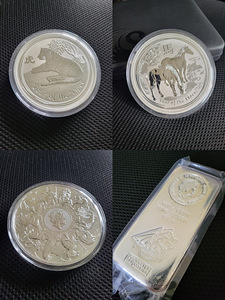 1 kg hõbemünt (2x Austraalia, 1x UK, 1x Cooki saared) (1 foto / 9)