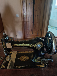 Ōmblusmasin Singer (4 foto / 7)