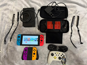 Nintendo Switch + Gamepad + JoyCons + Mängud + Kandekott (1 foto / 1)