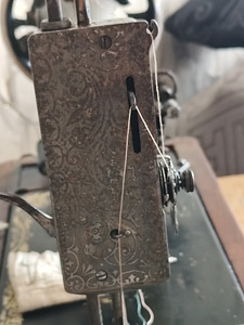 Singeri õmblusmasin aastast 1911 (5 foto / 10)
